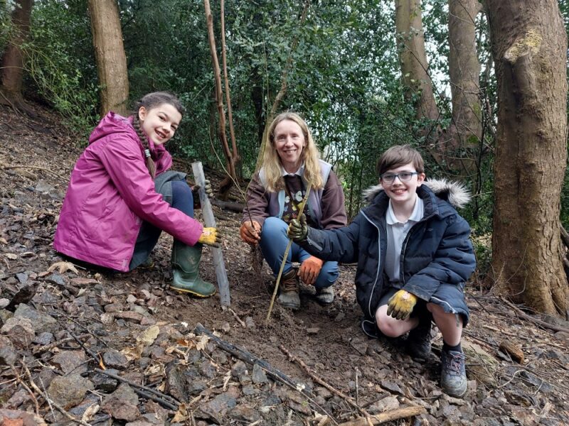 Ceo Deborah Fox Plants A Tree With Pupils From Malvern Wyche Primary School